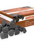 Box of Harvia sauna stones with some pieces in front on a white background