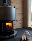Narvi Luosto VS Sauna Stove view from interior of sauna with wood laying next to heater