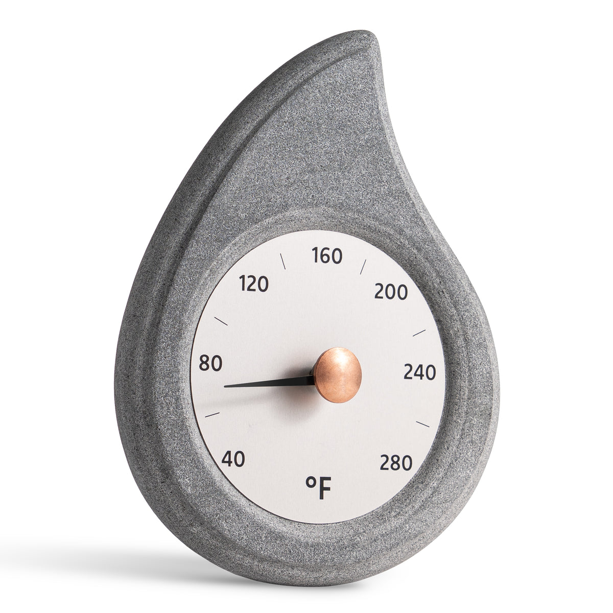 angled view of stone teardrop shaped sauna thermometer with a brass knob on a white background