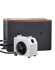 Stainless cuboid cold plunge with the chiller connected alongside