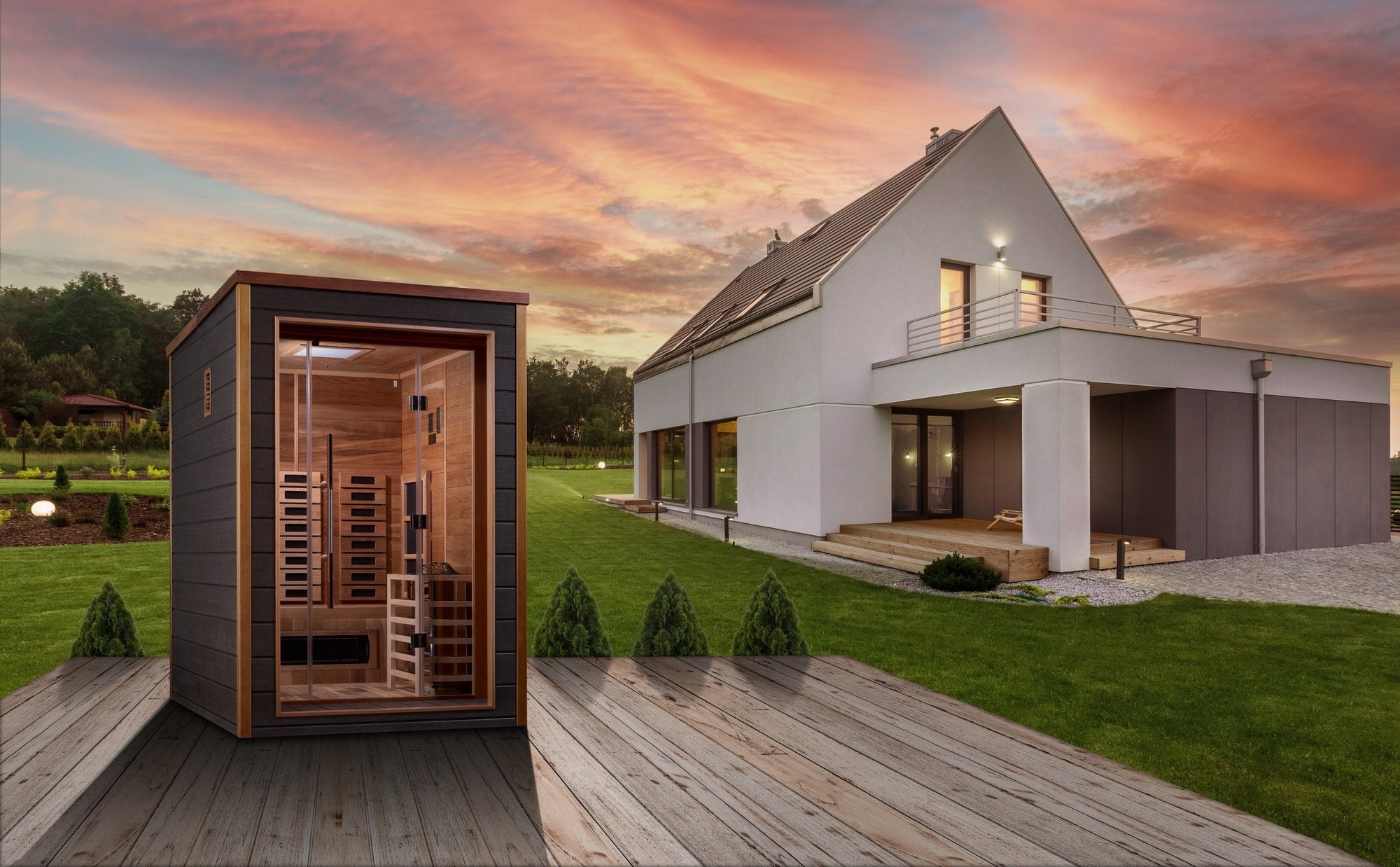 Nora sauna in a landscaped yard at dusk