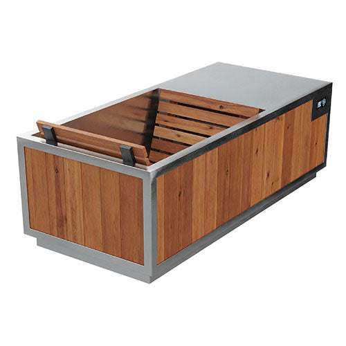 A rectangular cold plunge tub with a brushed silver metal frame and wood-look paneling, shown with the lid open to reveal the interior slatted deck. A small control panel is visible on the right side.