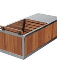 A rectangular cold plunge tub with a brushed silver metal frame and wood-look paneling, shown with the lid open to reveal the interior slatted deck. A small control panel is visible on the right side.