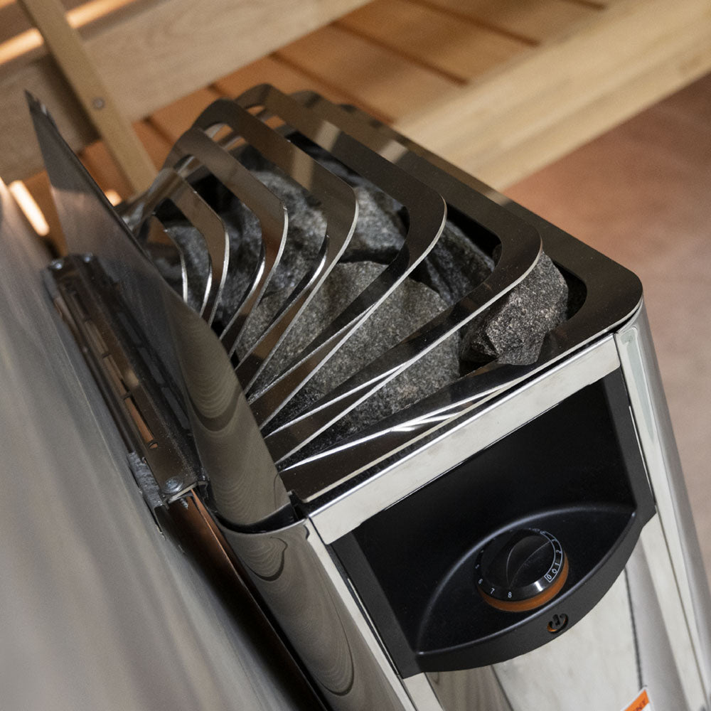 Harvia The Wall Sauna Heater Stainless Steel top view with stones under metal grate