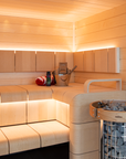 Harvia Cilindro Sauna Heater sauna interior with 2 bench levels and bucket with folded towel