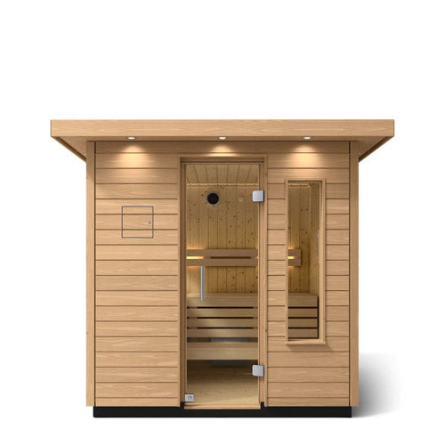 Kohler C2 sauna exterior with light wood front view with accent lighting on eaves and clear glass door
