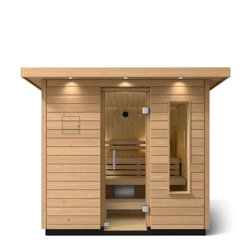 Kohler C2 sauna exterior with light wood front view with accent lighting on eaves and clear glass door