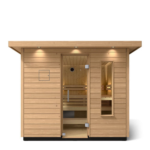 Kohler C2 sauna exterior with light wood front view with accent lighting on eaves and clear glass door