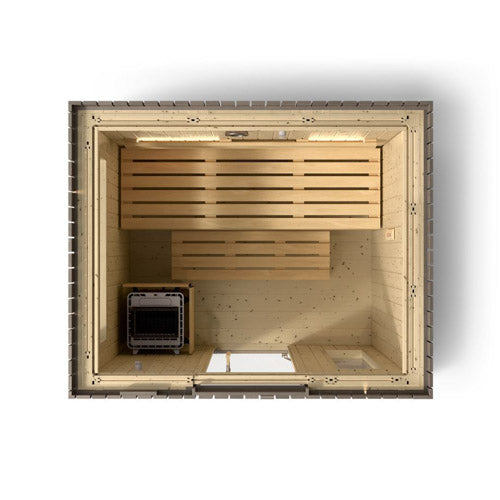 Kohler C2 Sauna Weathered Spruce top interior view with indirect lighting on back walls, heater to the bottom left and several levels of wooden benches 
