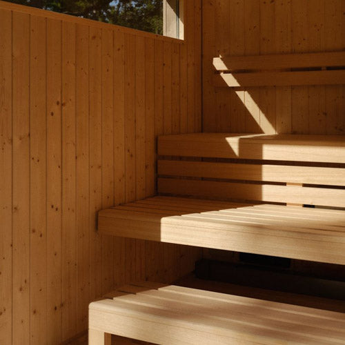 Kohler C2 Sauna Weathered Spruce levels of wooden benches