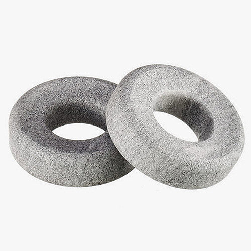 Two gray eye therapy stones on a white background