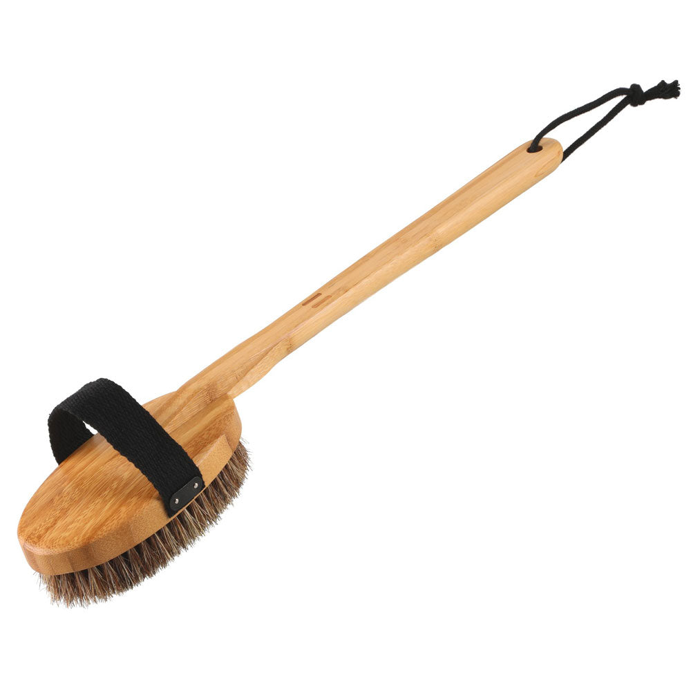 Wooden brush with bristles on a white background