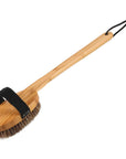 Wooden brush with bristles on a white background